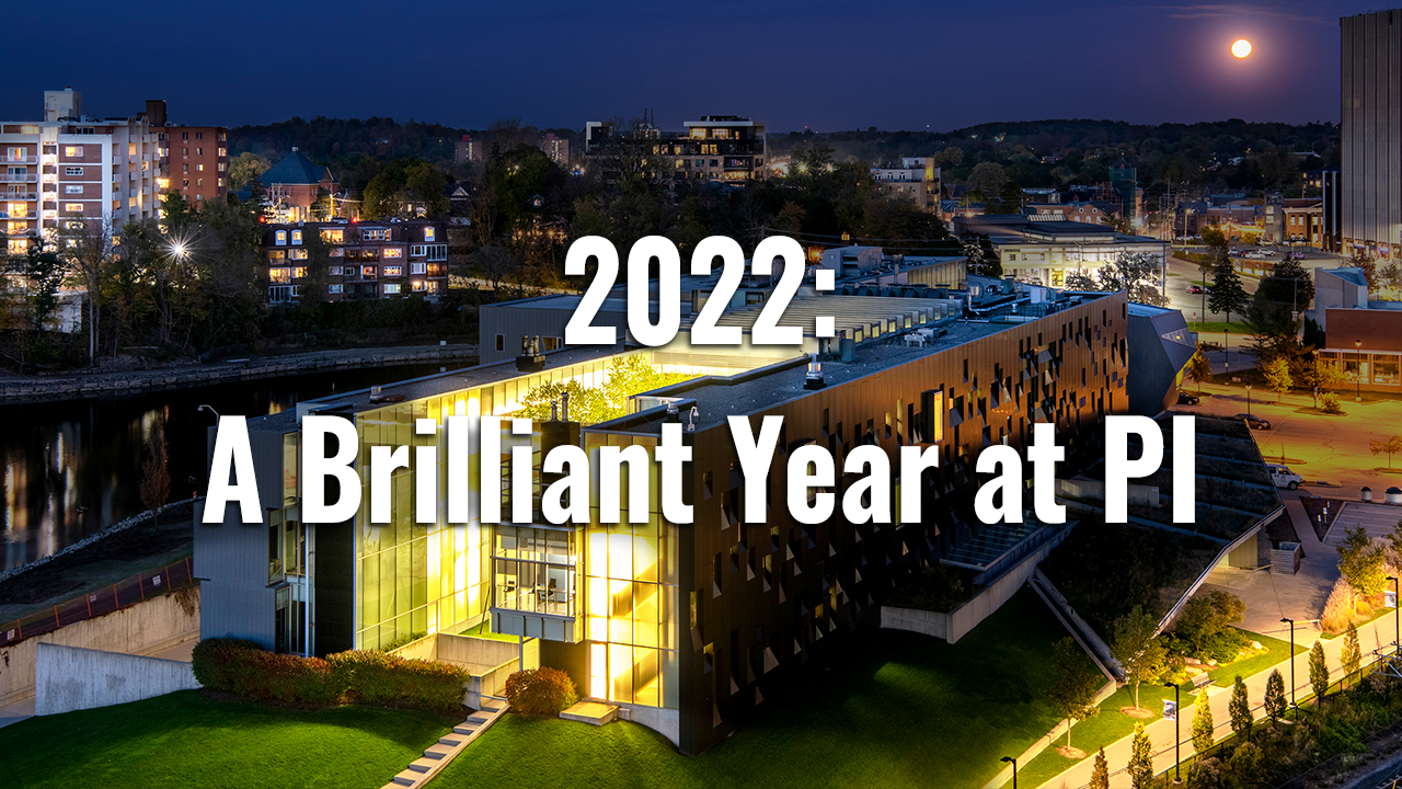 Aerial shot of Perimeter at night with 2022: A Brilliant Year at PI text